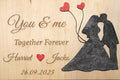 Personalized wooden plaque with engraved wedding couple, hearts, names, and date
