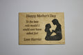 Plywood Mother's Day plaque with an embossed figure of a mother and child and engraved heartfelt message